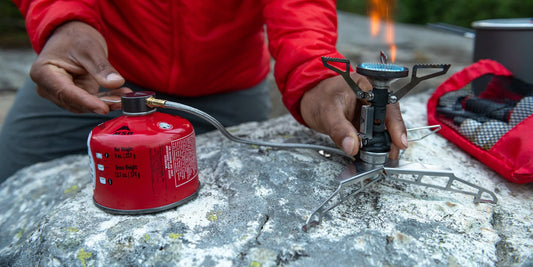 Adjusting flame on MSR PocketRocket Deluxe Stove