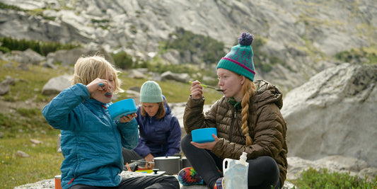 Family eating at camp