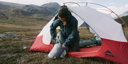 Packing sleeping bag in stuff sack