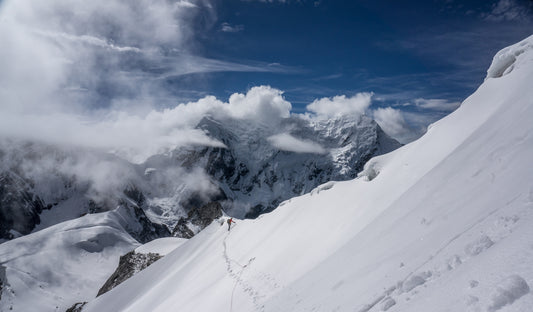 climbing snowy mountain peaks