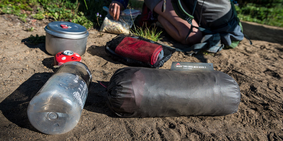 Thru-hiker gear; MSR Mesh House 2, fuel canister, Titan Kettle, Packtowl, water bottle