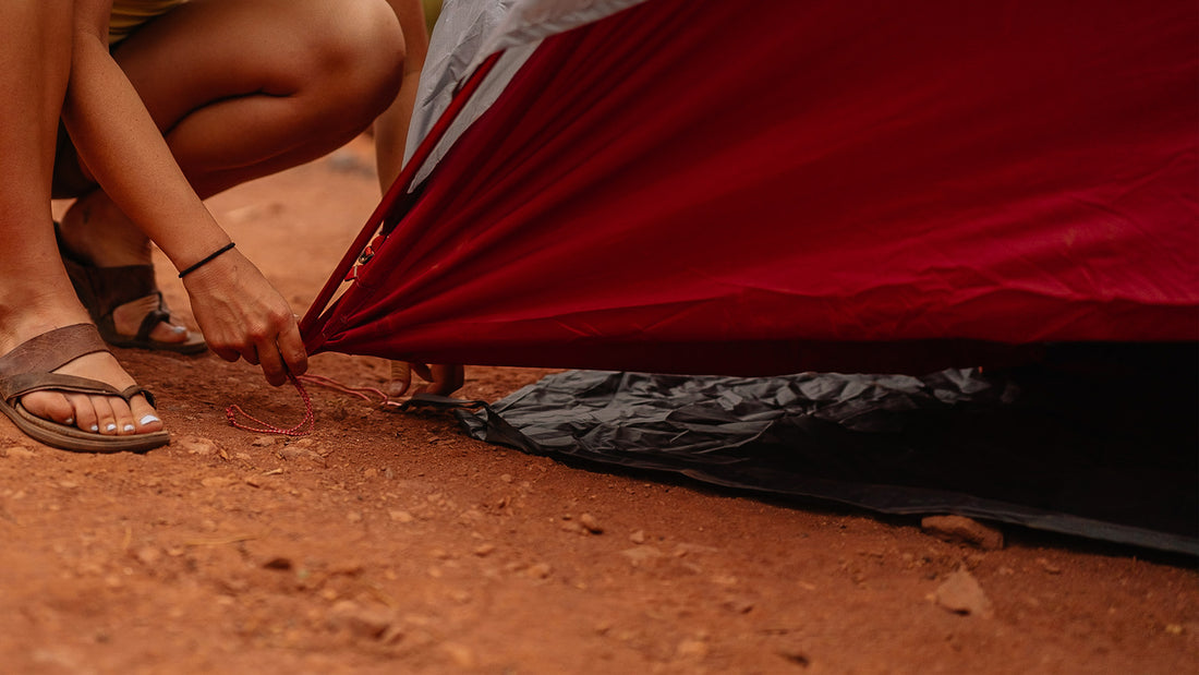 setting up tent with footprint